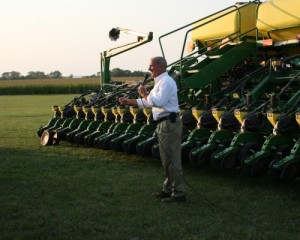 Greg Sauder, president of Precision Planting, talks about the benefits of hydraulic planting depth control technology during Monsanto’s FieldScripts field day at the Farm Progress Show.