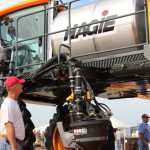 A Farm Progress attendee checks out the new 2014 Hagie STS Sprayer. 