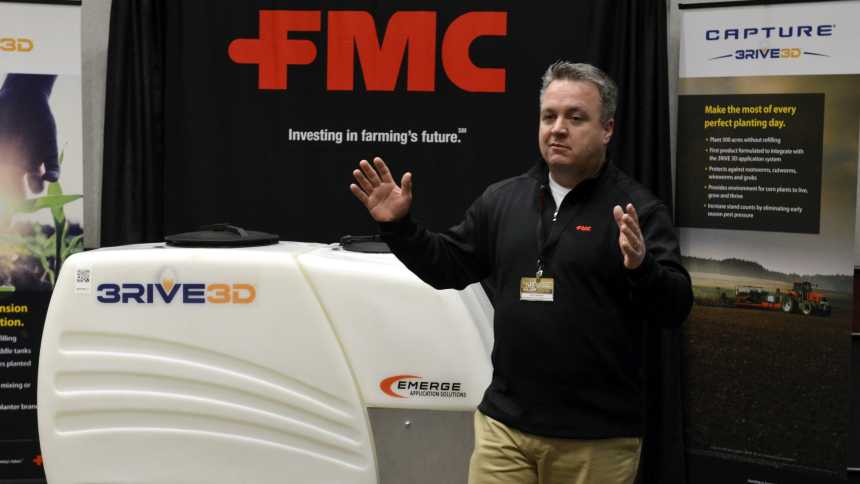 FMC's Matt Hancock explains the 3RIVE 3D in-furrow application delivery system at the 2015 Commodity Classic.
