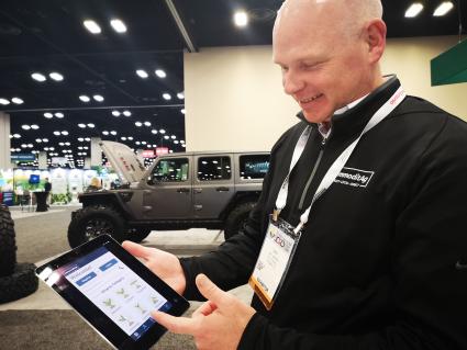 John Demerly demos the CommoditAg site on the 2020 Commodity Classic show floor.