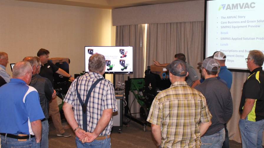 Visitors to the Rockford, IL, AMVAC Technology Summit gather to see the SIMPAS system features for themselves.
