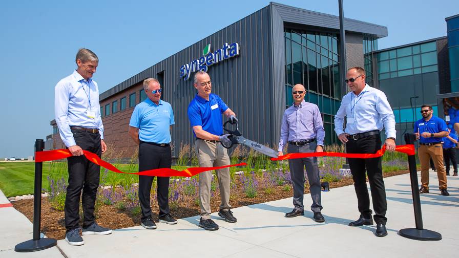 Cutting the ribbon marking the Grand Opening of the Syngenta Seeds R&D Innovation Center in Malta, Illinois are (left to right) Erik Fyrwald, Chief Executive Officer, Syngenta Group; Eric Boeck, Regional Director North American Seeds; Warren Kruger, Head of Field Crops Seeds Development for North America; Trevor Hohls, Global Head of Seeds Development; and Justin Wolfe, President Global Seeds.