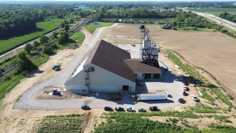 An aerial view of the nearly complete dry fertilizer hub which will service farmers in a 45-60 mile radius of New Castle. The hub’s two rail spurs and the capacity to unload 400 ton per hour and state-of the-art mixing system on the blend tower allows Co-Alliance to load a semi in under eight minutes.