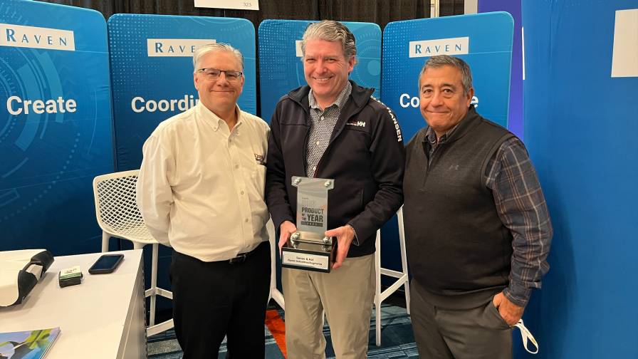 The trophy hand-off at the 2023 ARA show. From left: CropLife IRON’s Eric Sfiligoj, Raven’s Ben Voss, and CropLife’s Sal Settecase.
